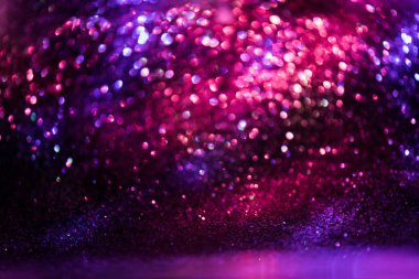 Bokeh sim Renkli Bulanık soyut arkaplan doğum günü, yıldönümü, düğün, yeni yıl arifesi ya da Noel için.