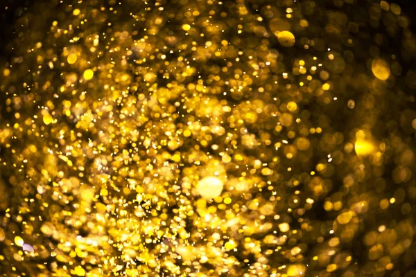 Třpytky zlaté bokeh Colorfull rozmazané abstraktní pozadí bir — Stock fotografie