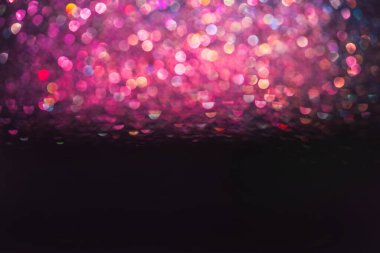 Doğum günü, yıldönümü, düğün, yeni yıl arifesi ya da Noel arifesi için parlak, bulanık ve soyut bir arka plan.