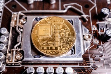 Bir kavram olarak sunan ilk madeni para. Bir bilgisayar baskılı devre ortasına Bitcoin para bir ICO yordamı kurulu