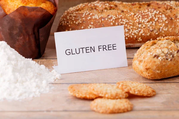 Bread and confectionery products from flour without gluten. The concept sympholizes the gluten free diet. The image illustrates a diet of healthy nutrition.