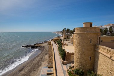 Coast path and Roquetas del Mar castle de Santa Ana Costa de Almera, Andaluca Spain  clipart