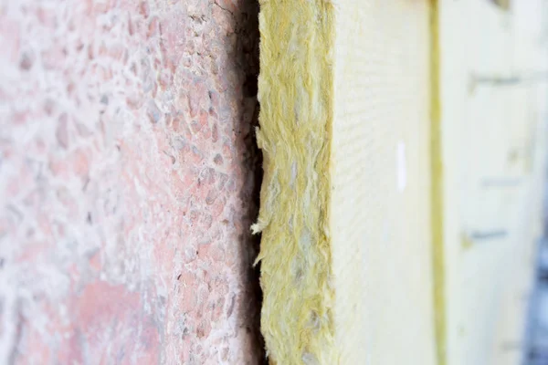 External repair work on the building, insulation and cladding of the facade of the house