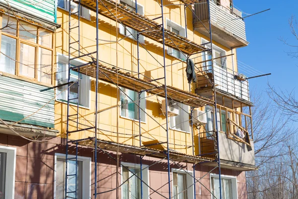 External repair work on the building, insulation and cladding of the facade of the house