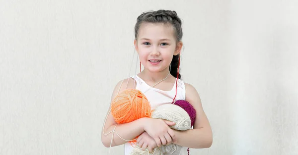 Girl Balls Thread Knitting Little Girl Holds Knitting Yarns Her — Stock Photo, Image