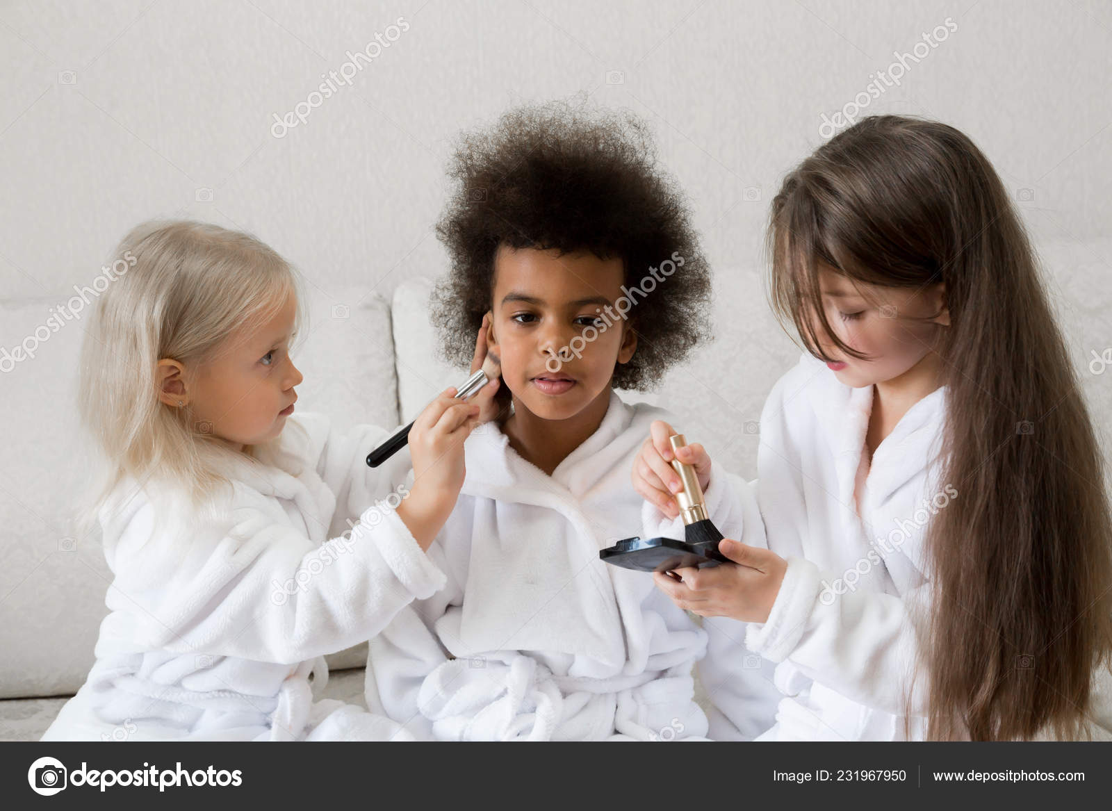 little girls playing with makeup