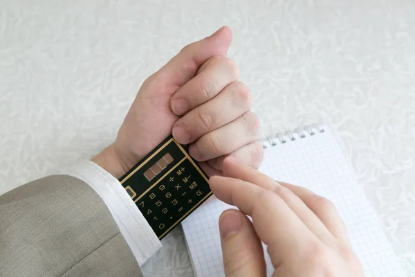 The student writes off the use of prohibited materials on the exam. An exam tucked away in clothes.