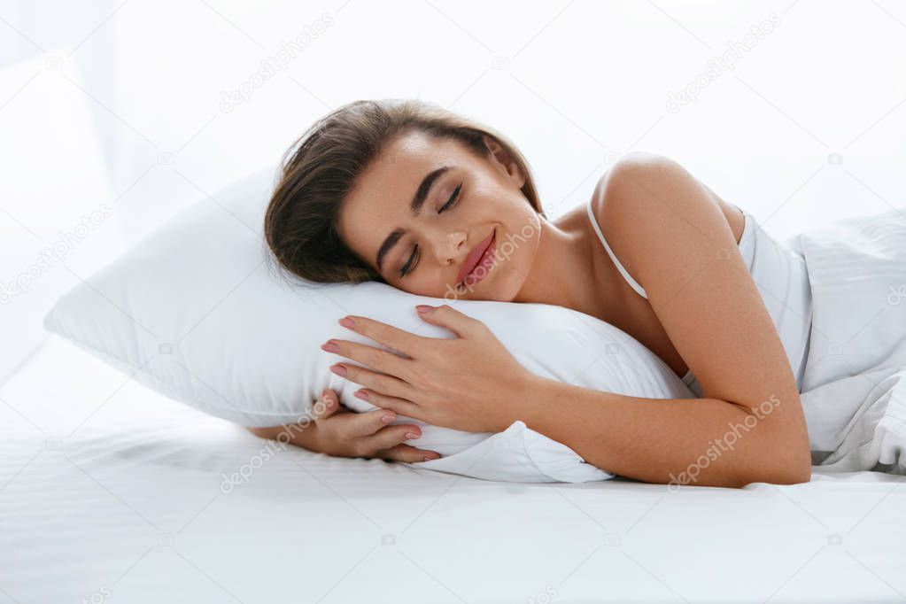 Pillows. Woman Resting On White Pillow Sleeping In Bed. High Resolution.