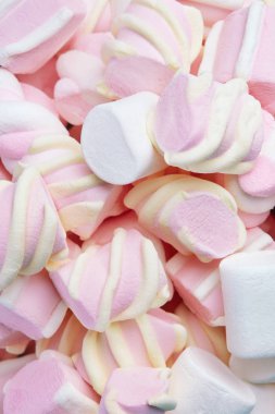 Arka plan üzerinde Marshmallows şekerler. Hatmi tatlılar natürmort kadar kapatın. Yüksek çözünürlük
