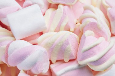 Arka plan üzerinde Marshmallows şekerler. Hatmi tatlılar natürmort kadar kapatın. Yüksek çözünürlük
