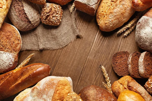 Food. Bread And Bakery Goods On Wooden Background. High Resolution