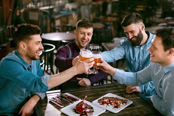 Men Drinking Beer Pub Friends Toasting Alcohol Drinks Bar High — Stock Photo, Image