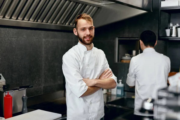 Happy Cook In Restaurant Kitchen. Man Working As Chef. High Resolution.