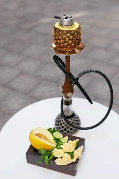 Shisha And Fruits In Hookah Bar Closeup. Hookah With Fresh Fruit On Table In Restaurant. High Resolution