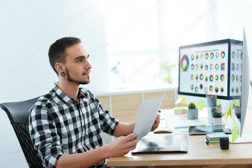 Web Designer Working On Design Project In Office. Man Creating Webdesign On Computer. High Resolution