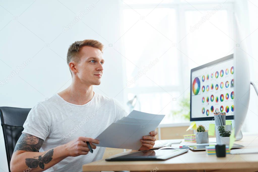 Web Designer Working On Design Project In Office. Man Creating Webdesign On Computer. High Resolution