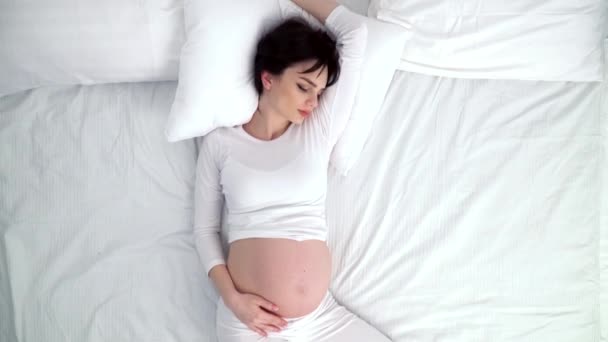 Pregnant Woman Sleeping In Bed At Home — Stock Video