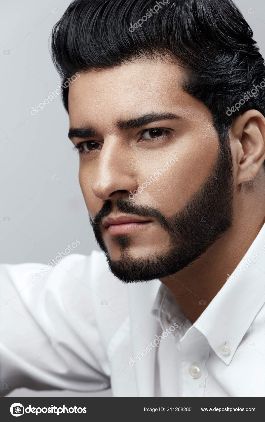 Handsome Man With Hair Style, Beard And Beauty Face Portrait Stock Photo by  ©puhhha 211268280
