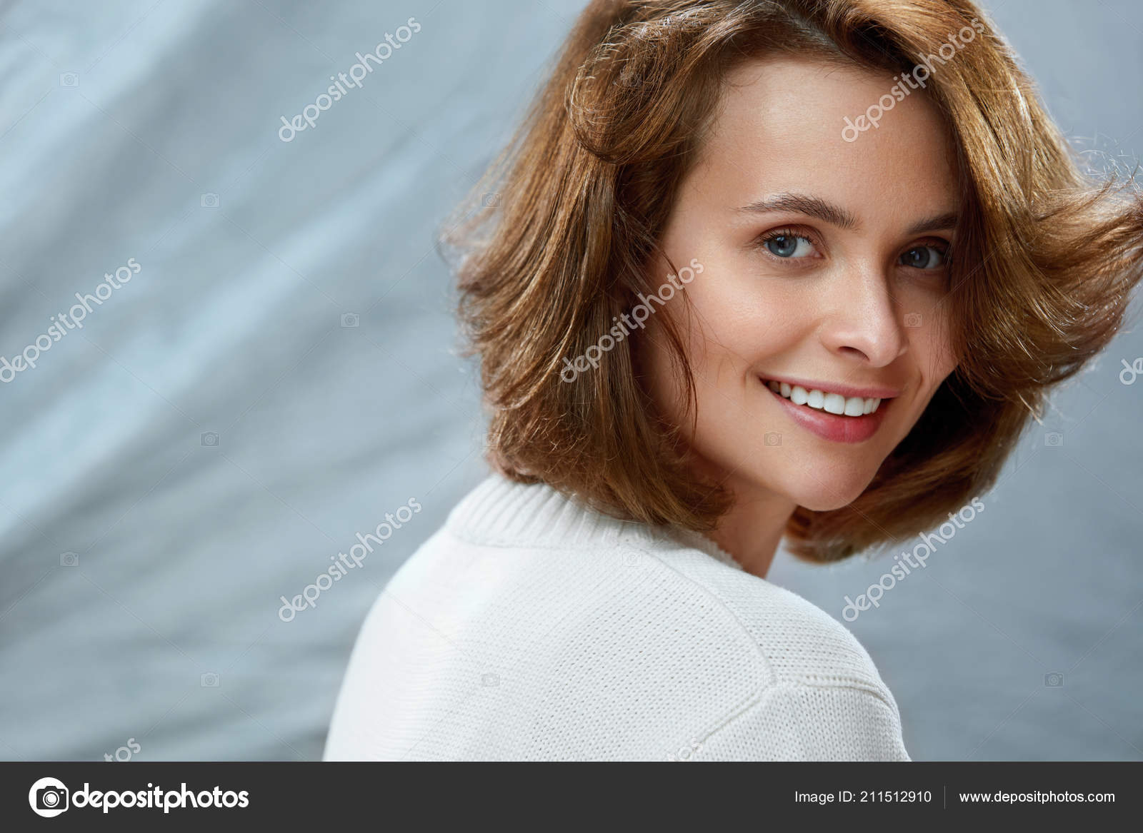 Beautiful Woman With Beauty Face Short Hair And Natural Makeup