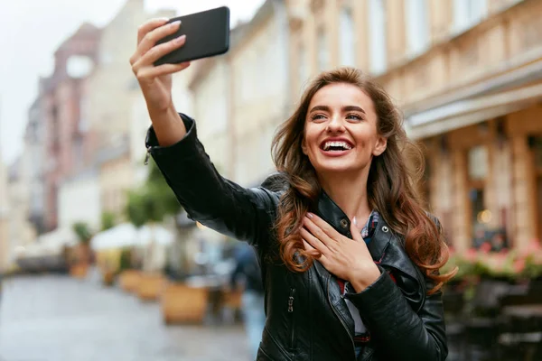 Woman Video Calling On Phone On Street, Taking Photos
