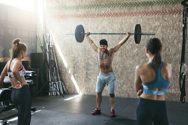 Sport. Crossfit Athletes At Workout Gym