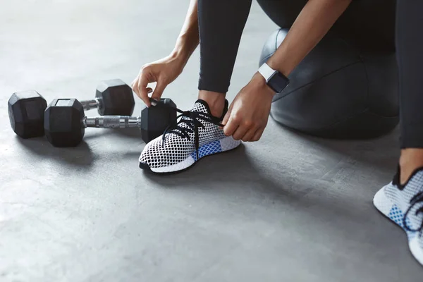 Sports Shoes. Woman Hands Tying Shoelaces On Fashion Sneakers