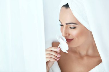 Beauty Spa Salon. Woman In Towel After Body Skin Care clipart