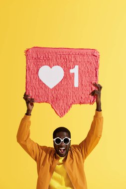 Like. Smiling black man with like icon, heart pinata portrait clipart