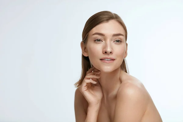 Beauty face. Woman model with healthy natural skin on white — Stock Photo, Image