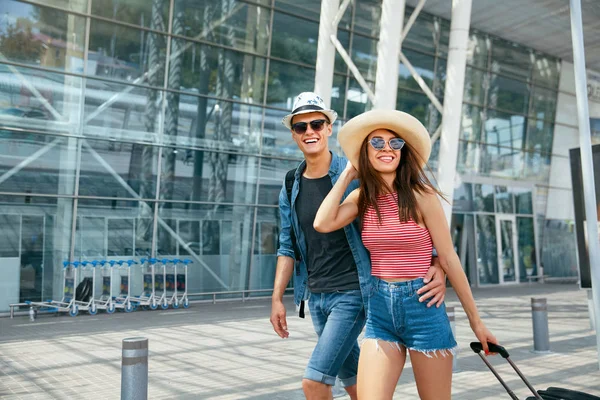 People Travel. Couple Near Airport, Traveling On Vacations