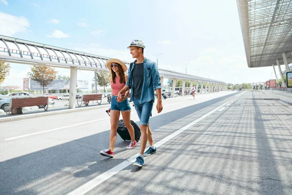 People Travel. Couple Near Airport, Traveling On Vacations