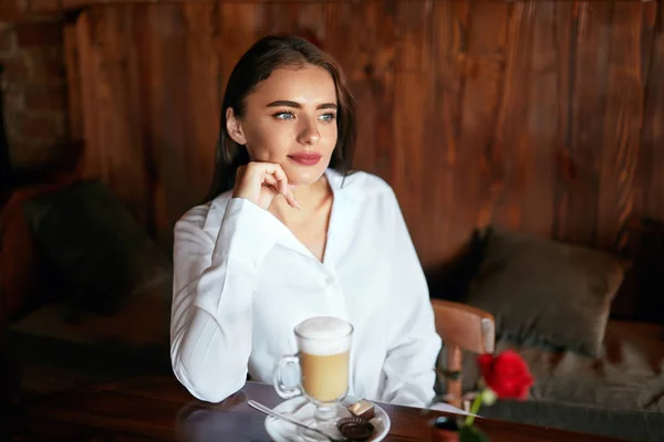 Woman Drinking Coffee In Cafe — Stock Photo, Image