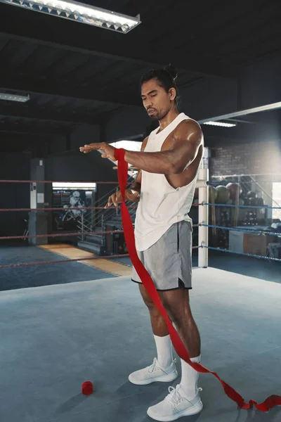 Man With Hand Wrap On Boxing Ring. Portrait Of Sportsman With Muscular Body Using Wrist Bandage For Training At Gym. Portrait Of Handsome Asian Guy On Workout. — Stock Photo, Image