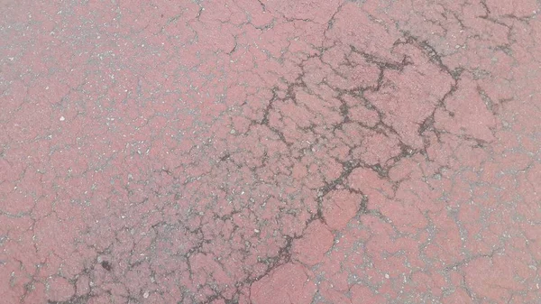 Estrada Danificada Cor Vermelha Caminho Pavimentado Com Crepitações Diferentes Shpaes — Fotografia de Stock