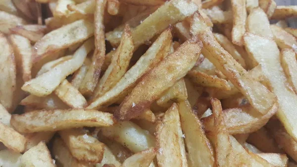 Close-up beeld van aardappel frietjes of geroosterde aardappel stokken — Stockfoto