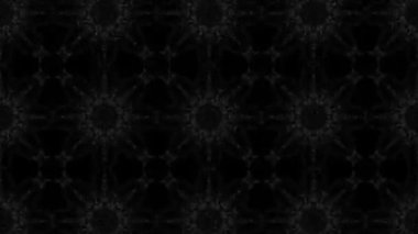 Kaleidoscope siyah arka planda değişen şekiller dumanlı animasyon ile