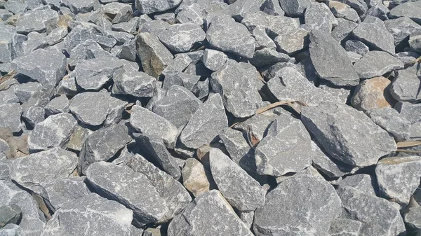 Fondo de textura: guijarros de roca, pequeños, redondeados, guijarros lisos —  Fotos de Stock