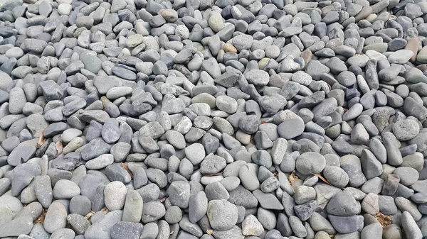 Textuur achtergrond: Rock Pebbles, kleine, afgeronde, gladde pibbles — Stockfoto