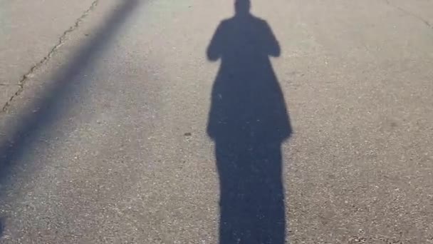 Close View Silhouette Person Grey Color Concrete Floor Moving Shadow — Stock Video