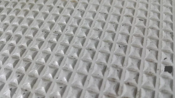 Primo piano vista di colore grigio belle forme geometriche 3D di piastrelle del pavimento — Foto Stock