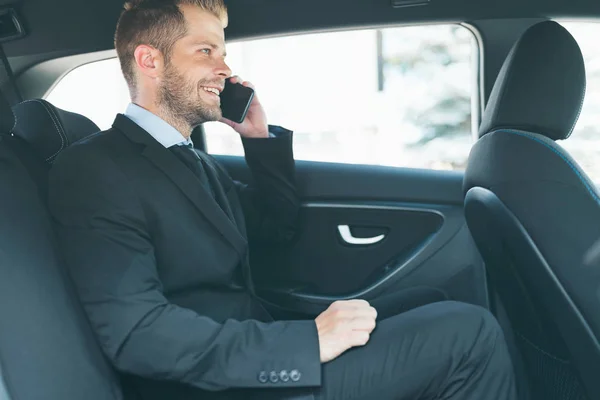 Executive Businessman Sitting Back Car Using Mobile Phone — Stock Photo, Image