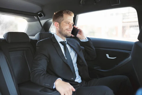 Executive Businessman Sitting Back Car Using Mobile Phone — Stock Photo, Image