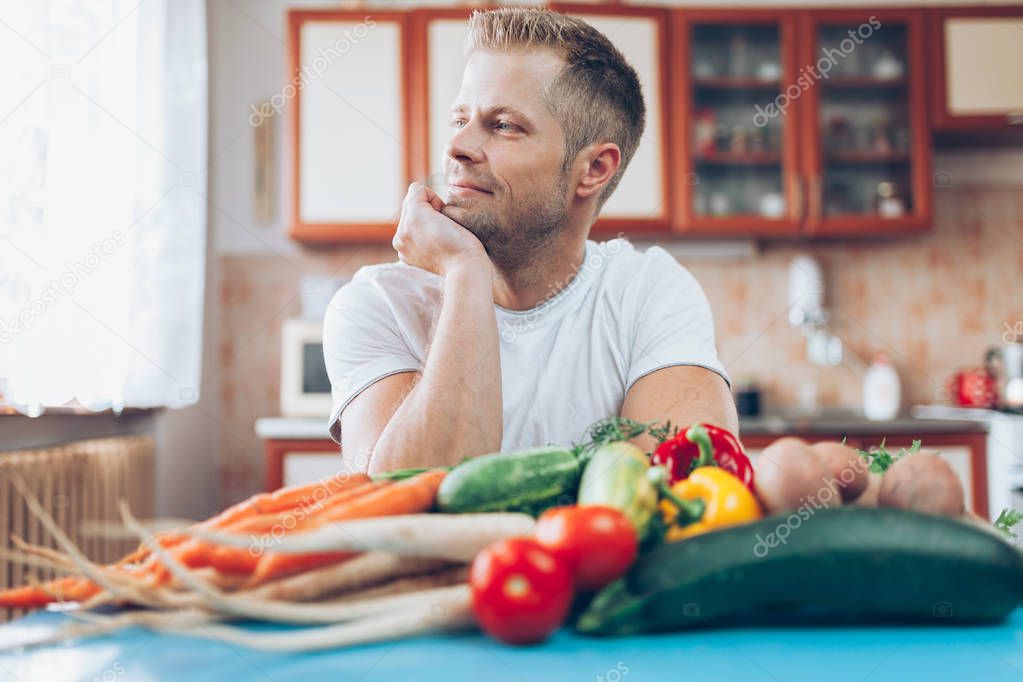 Young man at home on a healthy diet