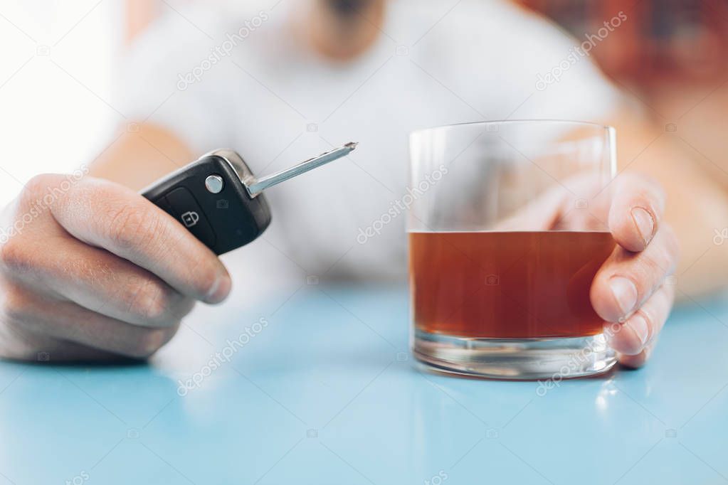 Drunk man at the bar intends to drive back home
