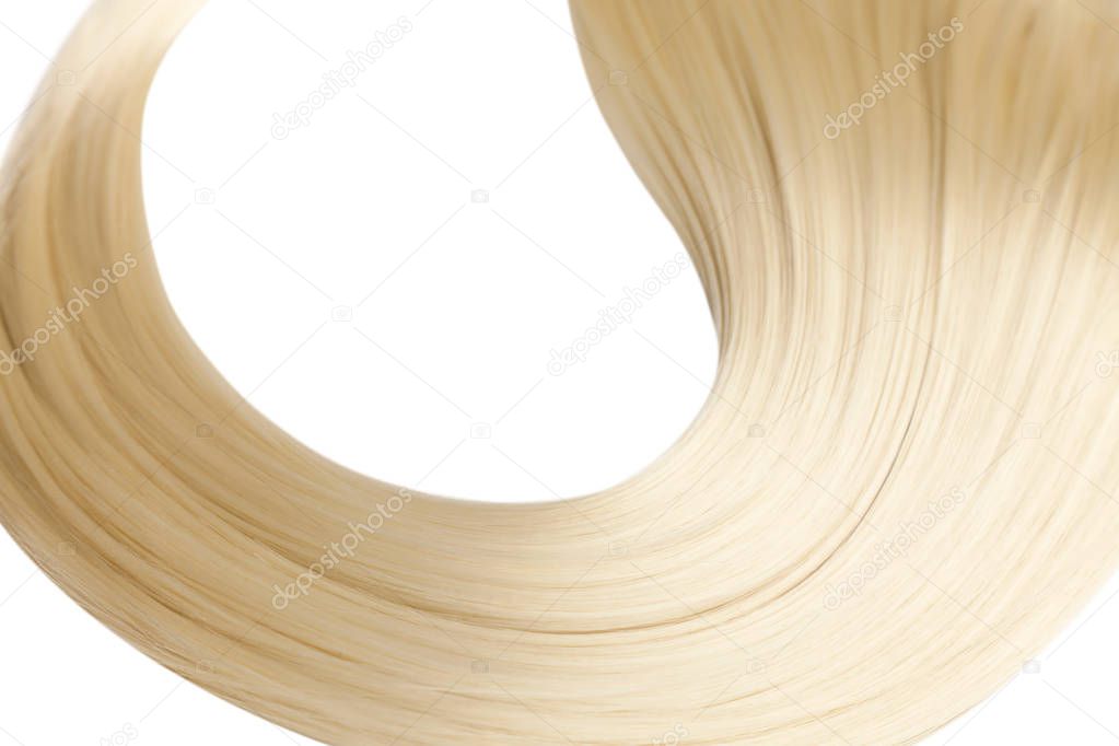 Closeup on luxurious straight glossy blonde hair