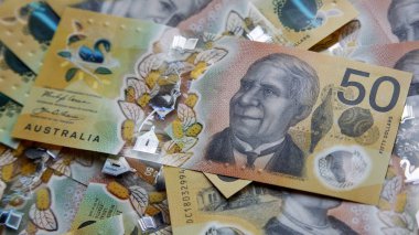 Avustralya 50 dolarlık banknot. Yeni 2019 sayı tasarısı sahteciliği caydırmak için tasarlanmıştır, not polimer ve berrak bir holografik şerit ile suya dayanıklıdır.