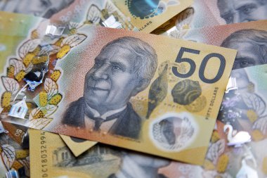 Avustralya 50 dolarlık banknot. Yeni 2019 sayı tasarısı sahteciliği caydırmak için tasarlanmıştır, not polimer ve berrak bir holografik şerit ile suya dayanıklıdır.