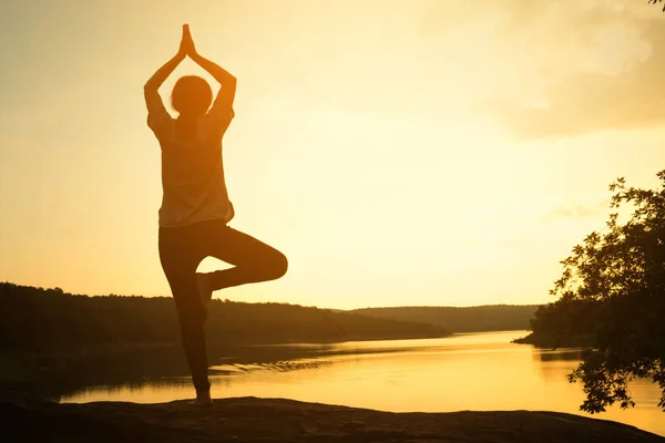 Silhouette young women yoga on nature, Concept yoga.