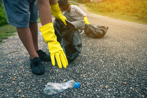 Group of kids volunteer help garbage collection charity environment.