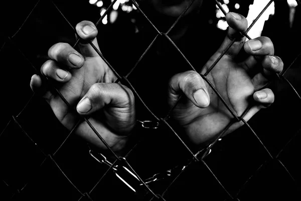 Close up the hands of the prisoners. — Stock Photo, Image